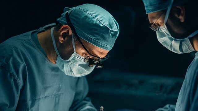 Surgeons performing heart bypass surgery in a modern Iranian hospital, highlighting advanced care and medical expertise.